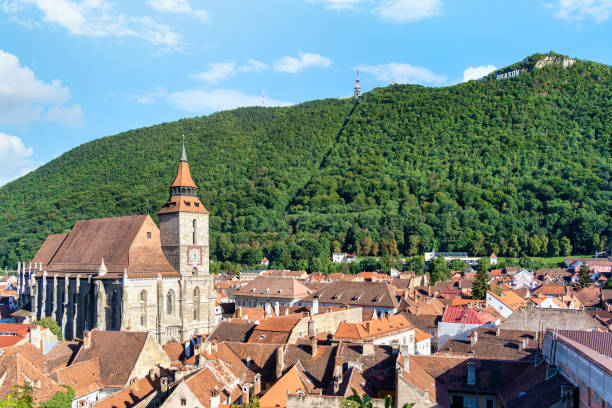 Aerial view with The black church (Biserica Neagra) located in the center of Brasov. Aerial view with The black church (Biserica Neagra) located in the center of Brasov. Famous tourist attraction. 11189 stock pictures, royalty-free photos & images