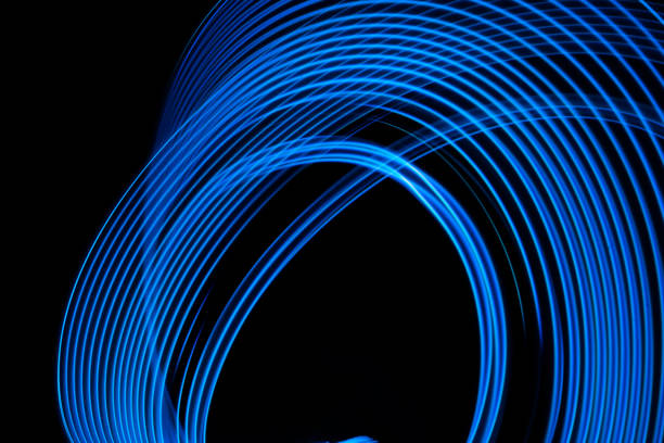 istock Abstract background neon electric blue glowing lines. 1965345148
