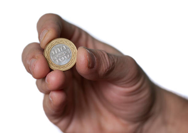 Adding a 1 euro coin in a moneybox slot