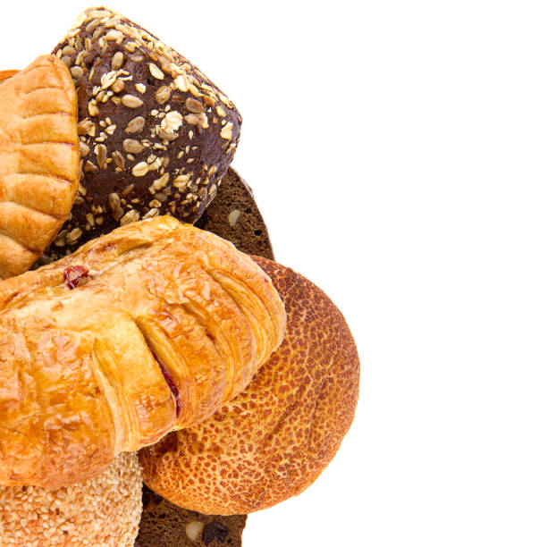 istock Sweet pastries and bread isolated on white. Free space for text. 1965440247