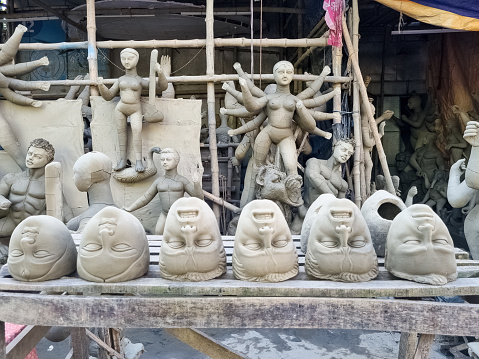 Kolkata, West Bengal, India- September 20 2019: Making of clay sculpture of Hindu Goddess Durga also known as Maa Durga for bengal's biggest celebration Durga Puja Utsav