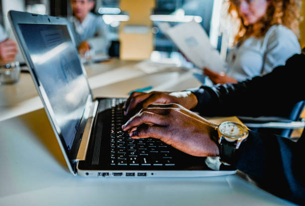 istock Man working on a laptop in the office 1965545912