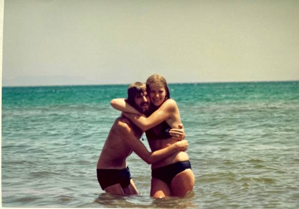 Young couple on honeymoon vacation in the 1970 stock photo