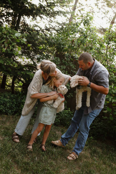 istock Family with Dogs 1965683894