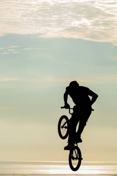 istock Freestyle cyclist practicing street BMX 1965686071