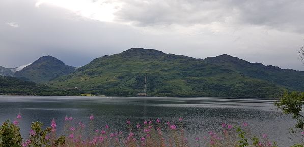 Scenic view of a lake and a mountain range, Inversnaid, Stirling, Scotland UK