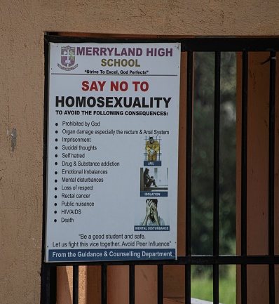 Entebbe, Uganda - 01 17 2024: Poster on the entrance gate of an elementary school in Uganda explaining the risks attached to Homosexual behavior