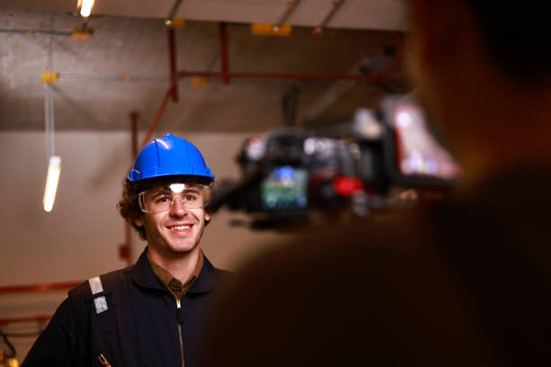 Video media shooting smart electrical engineer, live streaming in factory
