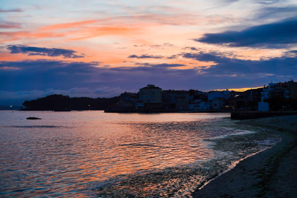 beautiful view of a coast town on a sunset perfect for summer vacacion