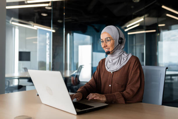 Free Stock Photo of Woman in hijab at the computer with headset ...