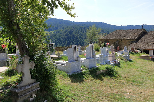 Voskopoja in Albania - September 14 2023: small Cemetery in Shipskë, oocated in the mountains
