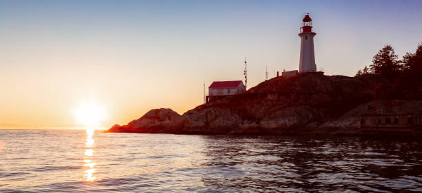 Lighthouse Park during sunny sunset. West Coast Pacific Ocean. Horseshoe Bay, West Vancouver, BC, Canada.