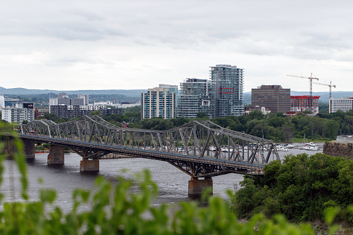 Ottawa, Canada - June 17, 2023: Ottawa River and Alexandra Bridge from Ottawa to Gatineau city of Quebec, Canada