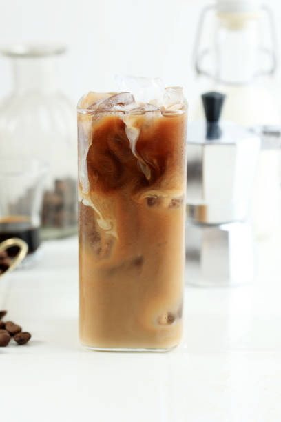 istock Ice Coffee Milk  in a Tall Glass with Cream. 1966022266