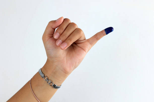 Female Showed hand with Ink for Indonesian ELection or Pemilu Presiden stock photo
