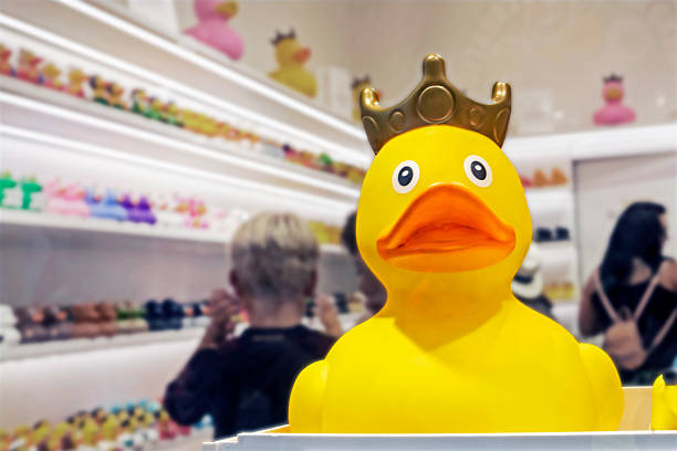 istock yellow toy rubber duck with a crown in a display case in a toy store 1966042016