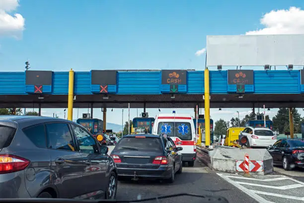 traffic jam on a toll road in Europe on a sunny day. Travelling by car