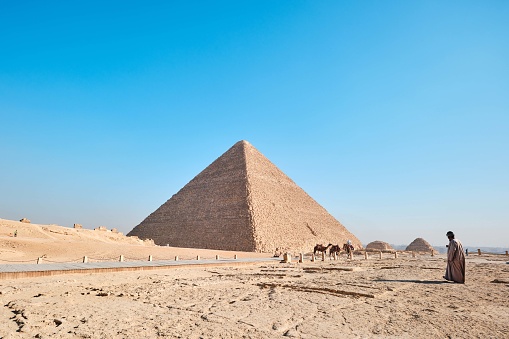 Giza, Egypt - December 12 2023: The Great Pyramid Khufu (Pyramid of Cheops) is the oldest and largest of the three pyramids in the Giza