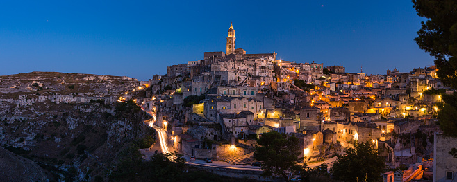 Matera, located in the Basilicata region of southern Italy, is a UNESCO World Heritage site known for its unique ancient cave dwellings carved into the rocky landscape. These cave homes, known as \