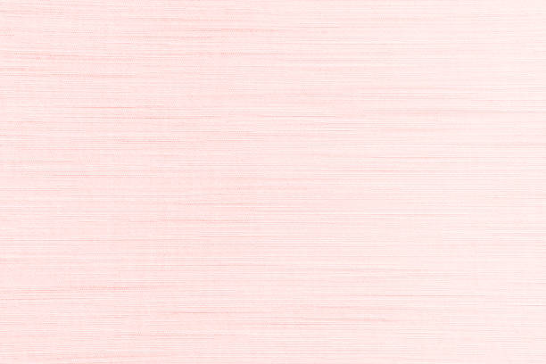 istock Rose gold pink background of silk fabric satin texture cotton cloth pattern 1966116147