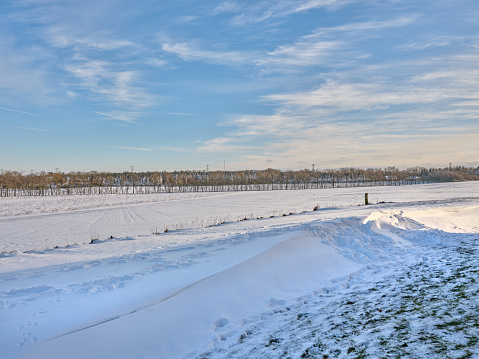 Snow landscape with blue sky for publication, poster, calendar, post, screensaver, wallpaper, cover. Sunny winter background. High quality photography