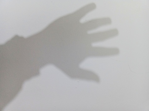 Shadow of human hand