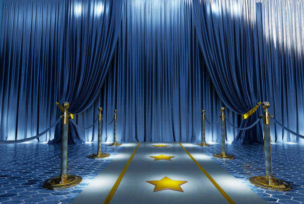 3D render of blue carpet with golden barriers leading to blue curtains background