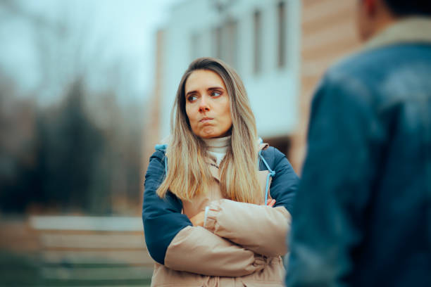 istock Sad Woman Fighting with her Husband Outdoors in the Park 1966254409