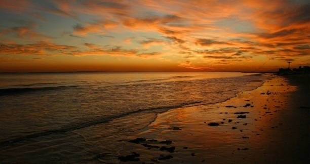 istock Red sunset over Brighton Beach, New York, USA 1966268500
