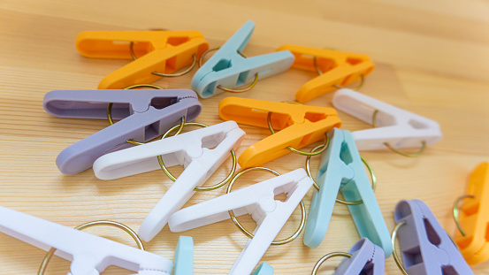 Colorful clothespins placed on the table