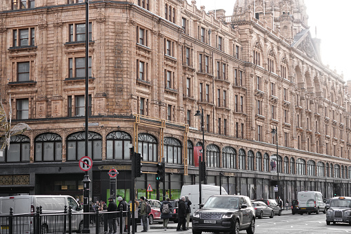 Brompton Road Street, Knightsbridge, SW1X 7XL, London, England, UK - January 24th 2024: Harrods Luxury Department Store in Kensington of the East End of London UK. It was constructed at the end of the 19th century.