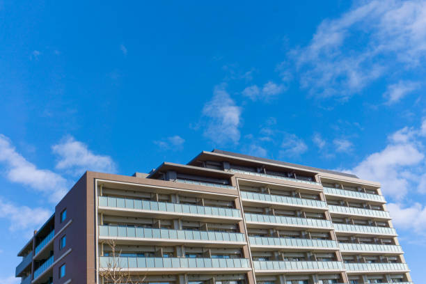 istock Apartment exterior and blue sky 1966347189