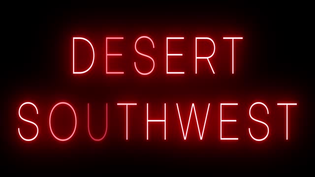 Glowing and blinking red retro neon sign for DESERT SOUTHWEST