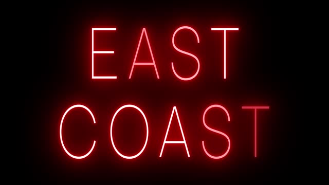 Glowing and blinking red retro neon sign for EAST COAST