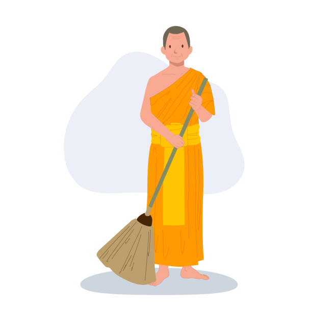 istock Monk in Traditional Robes Engaged in Daily Cleaning, sweeping the floor 1966562849