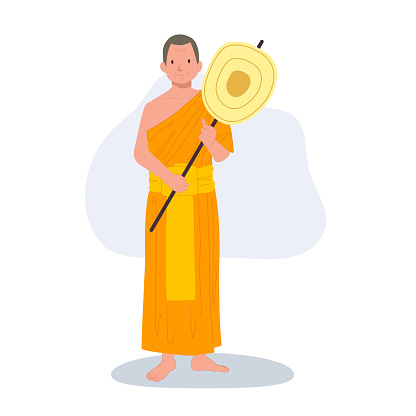 Full length standing Thai Monk in Traditional Robes with talipot fan.