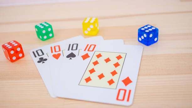 istock Playing cards and colorful dice 1966615735