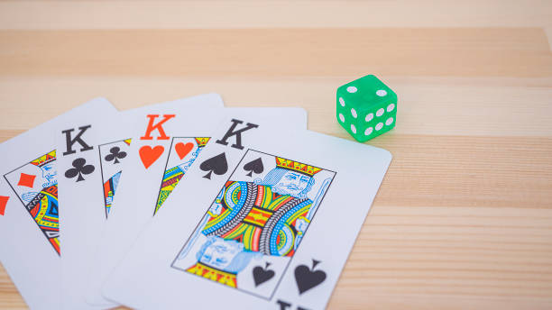 istock Playing cards and colorful dice 1966619480
