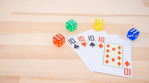 istock Playing cards and colorful dice 1966619482