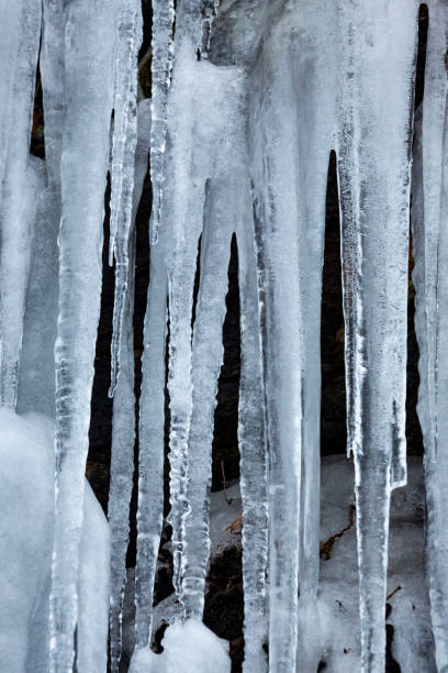 istock Patterns of icicles on a cliff in Bolton, Connecticut. 1966675140