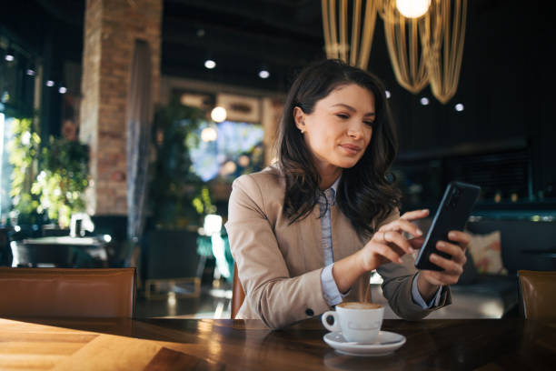 istock Business woman or freelancer in the cafe taking a break. 1966759653