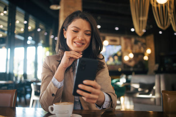 istock Business woman or freelancer in the cafe taking a break. 1966759671