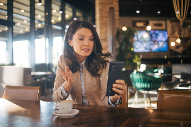 istock Business woman or freelancer in the cafe vlogging. 1966761217
