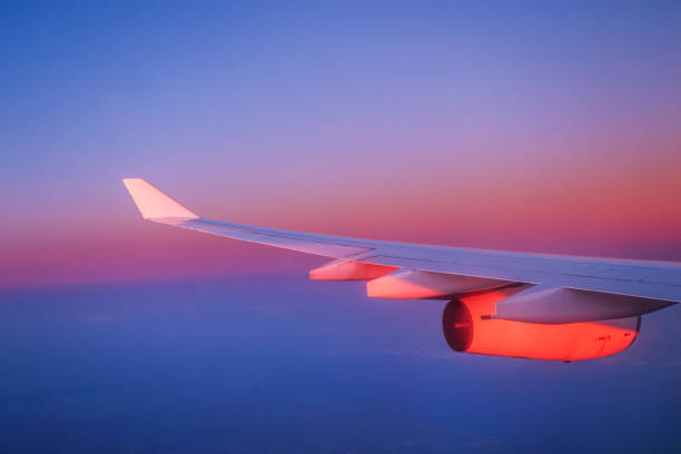 istock View from airplane window to see sky at twilight time. 1966777587