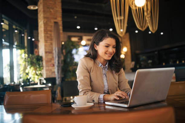 istock Business woman or freelancer in the cafe. 1966780780