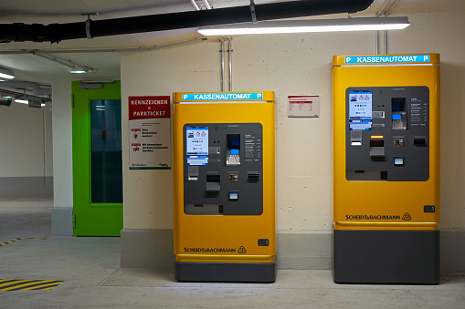 Tubingen, Germany - December 31, 2023: Ticketless pay station in the parking garage. Front view.