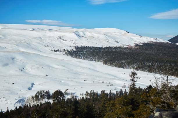 istock Mountain landscape in winter. The surfaces are covered with snow. 1966903742