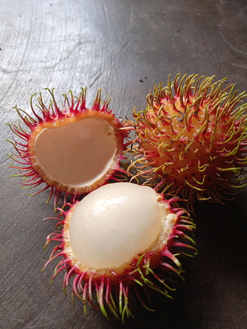 A plate of spiky rambutan fruits