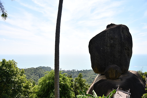 Overlap stone on Samui overlooks Lamai beach in Thailand