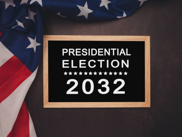 istock Presidential Election 2032 text on a mini blackboard over the American Flag 1966962896